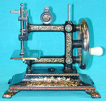 The Liliput toy sewing machine.